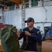 USS Ronald Reagan (CVN 76) Sailors prepare to cross deck to USS George Washington (CVN 73)