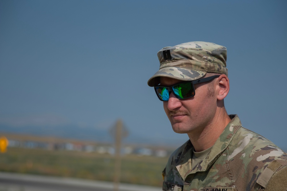 U.S. Army Cast. James Hanes sets up a decontamination tent for a training activity