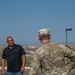 U.S. Army Capt. James Hanes and Mr. Lee Calf Looking set up a mass casualty simulation decontamination tent on Blackfeet Indian Reservation