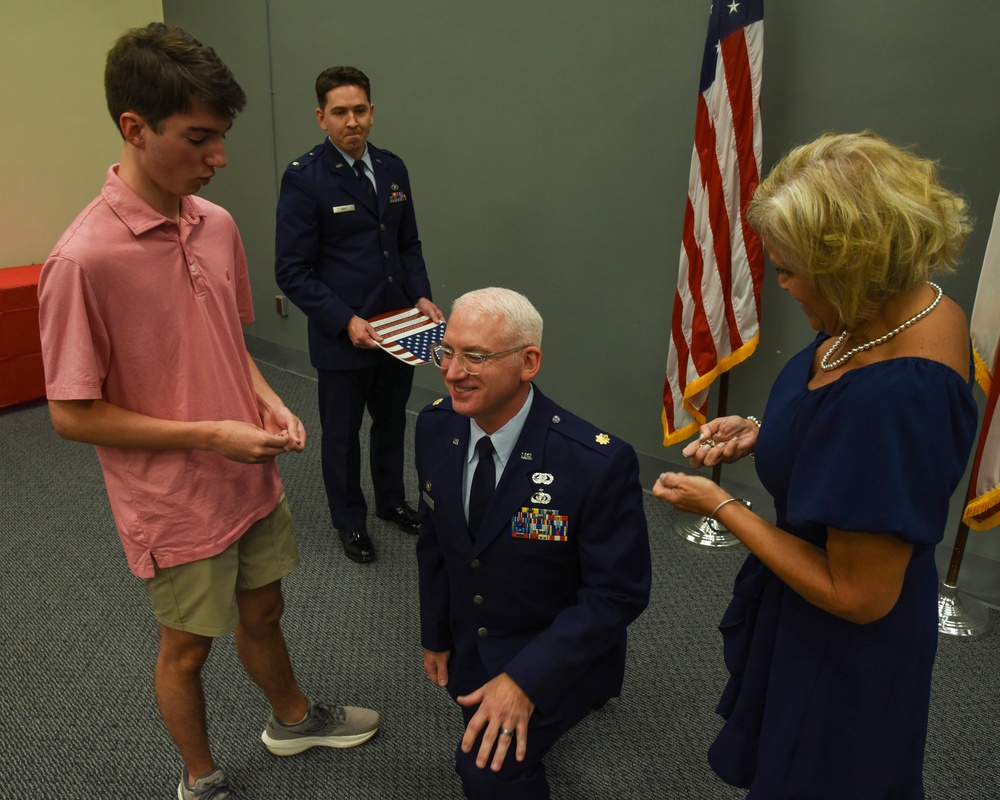 MAJ Chuck Hawkins is promoted in a ceremony