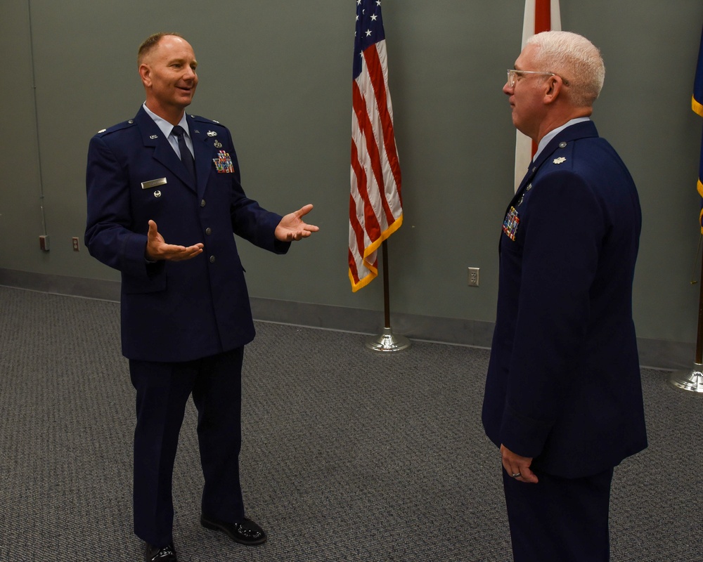 MAJ Chuck Hawkins is promoted in a ceremony