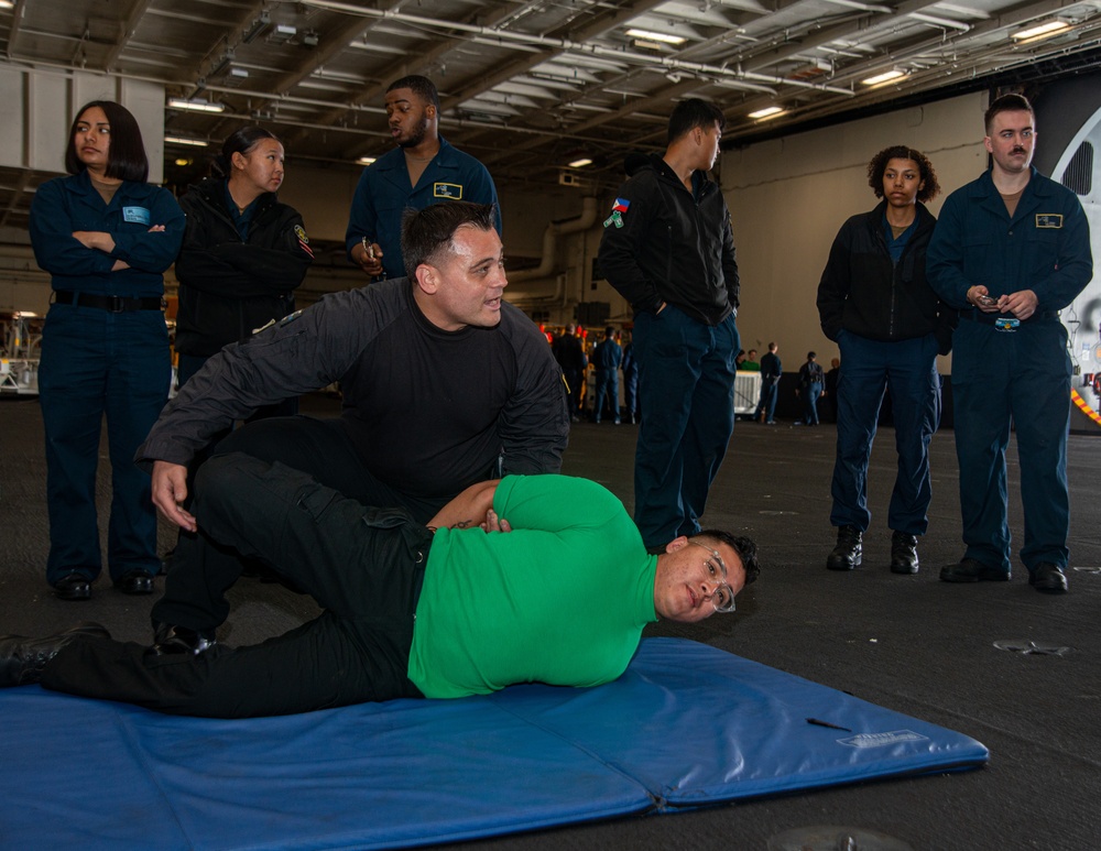 A Nimitz Sailor Conducts Training