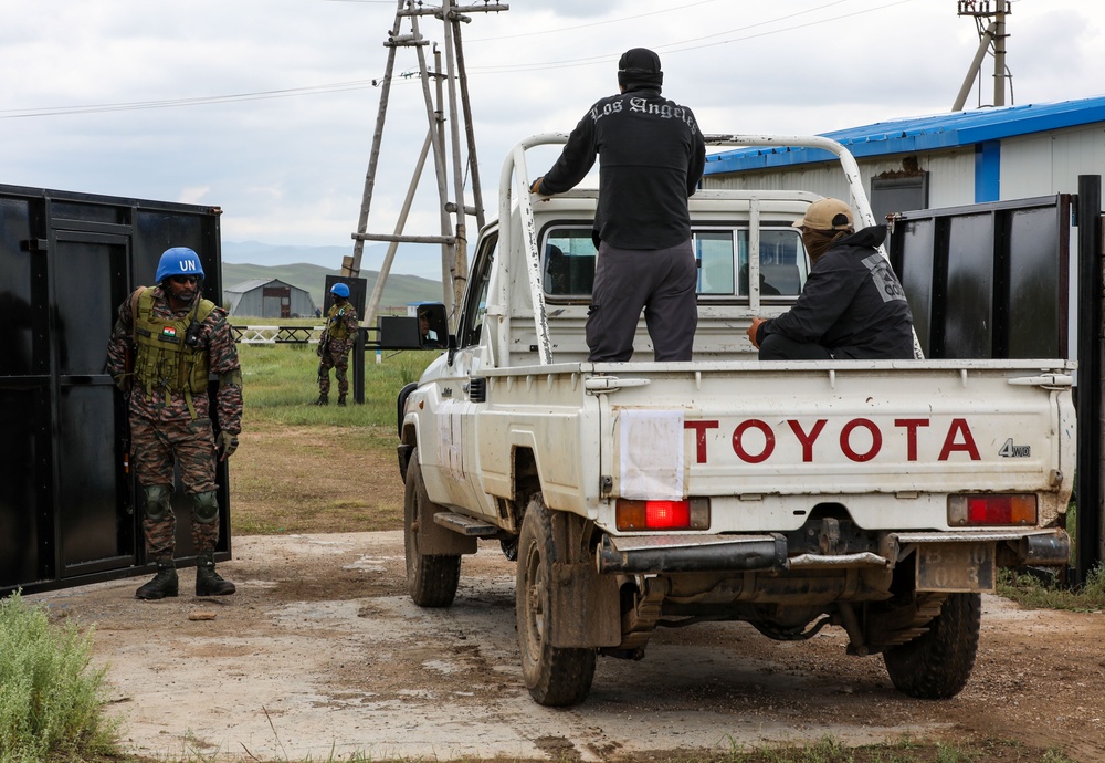 Indian soldiers conduct check point operations during multilateral peacekeeping exercise Khaan Quest 24