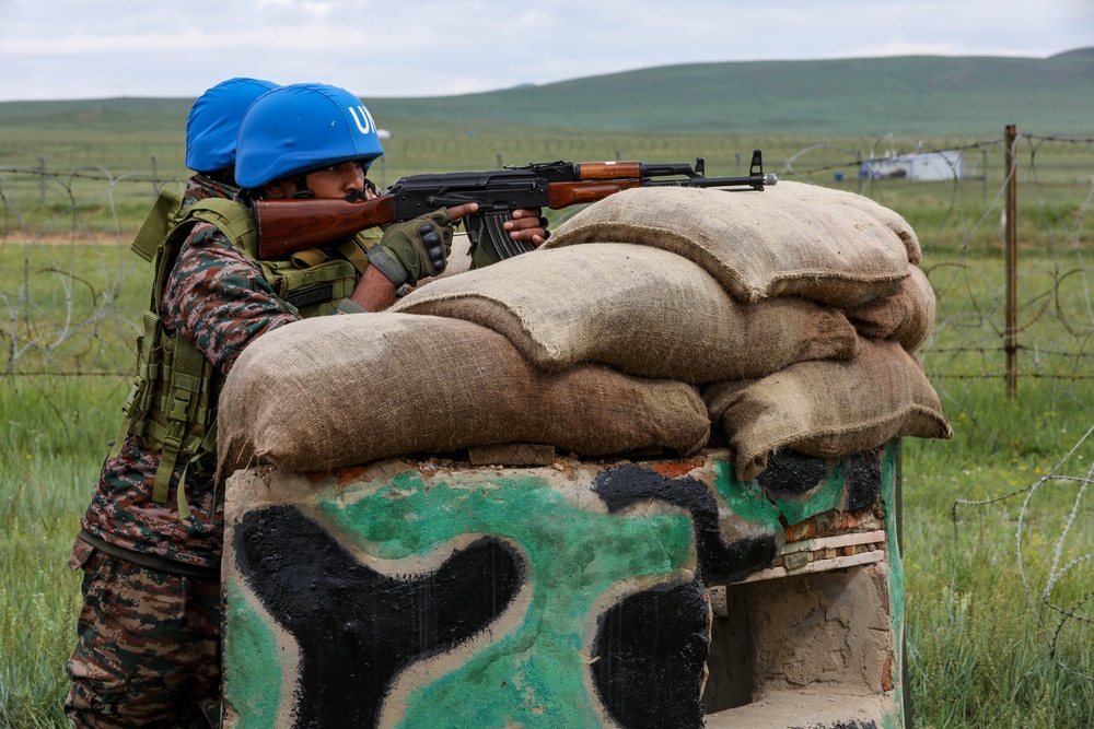 Indian soldiers conduct check point operations during multilateral peacekeeping exercise Khaan Quest 24