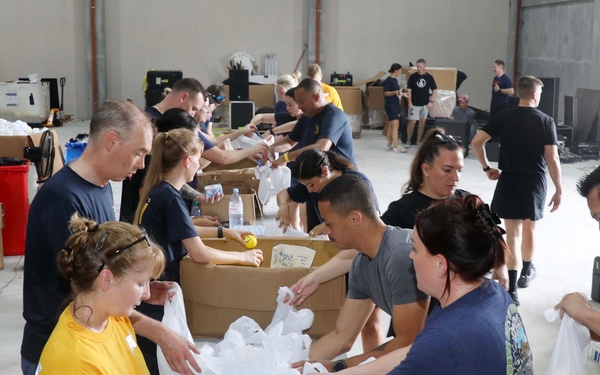Pacific Partnership members prepare hygiene kits
