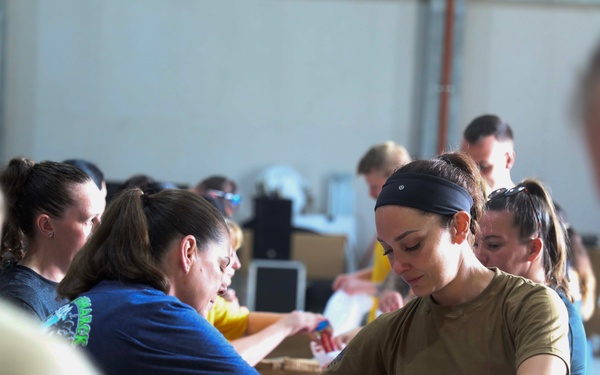 Pacific Partnership members prepare hygiene kits