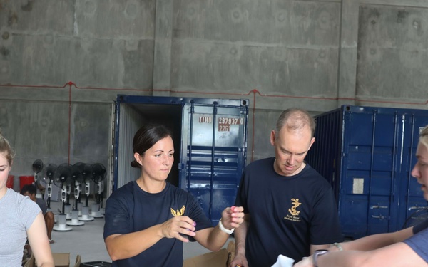 Pacific Partnership members prepare hygiene kits