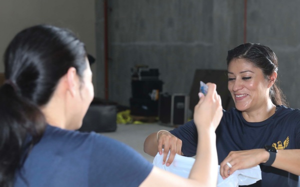 Pacific Partnership members prepare hygiene kits