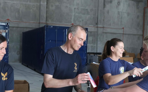 Pacific Partnership members prepare hygiene kits