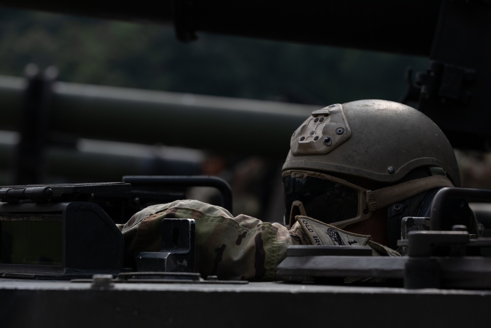 1st Armored Brigade Combat Team conduct M109A6 Paladin zeroing qualification tables during Operation Pacific Fortitude