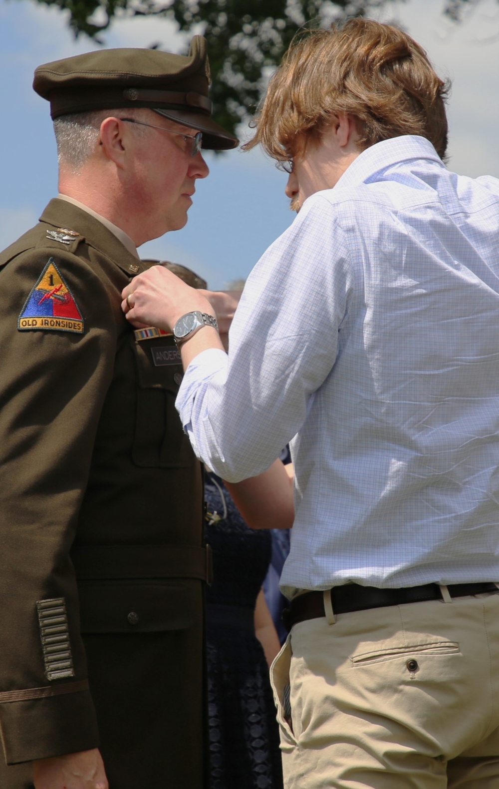 Removing Branch Insignia and Affixing General Officer Rank to Uniform