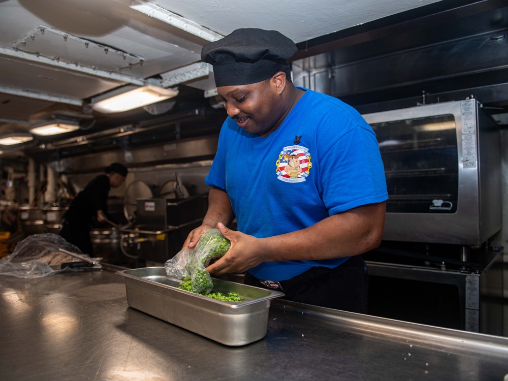USS Theodore Roosevelt Culinary Specialists Prepare Food for Sailors