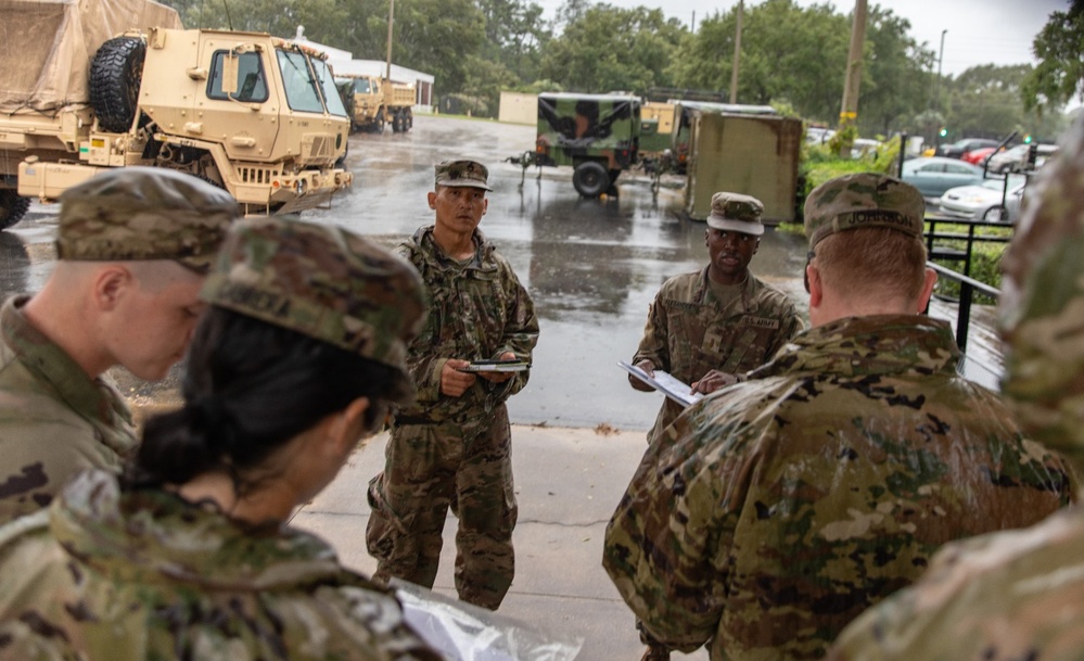 Command Briefs Team for Flood Response with High-Water Vehicles