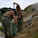 JB Charleston prepares sandbags in preparation for Hurricane Debby