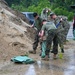 JB Charleston prepares sandbags in preparation for Hurricane Debby