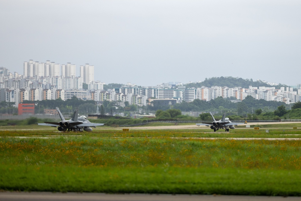 U.S. Marine Corps F/A-18 Hornets Fly Out of South Korea