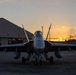 U.S. Marines with VMFA(AW) 224 maintain F/A-18 Hornet Aircraft after flight operations at Suwon AB