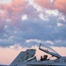 U.S. Marines with VMFA(AW) 224 maintain F/A-18 Hornet Aircraft after flight operations at Suwon AB