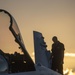 U.S. Marines with VMFA(AW) 224 maintain F/A-18 Hornet Aircraft after flight operations at Suwon AB