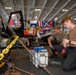 Sailors Aboard USS Carl Vinson (CVN 70) Conduct Maintenance on an MH-60S Sea Hawk