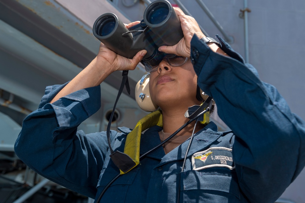 Sailor Aboard USS Carl Vinson (CVN 70) Stands Watch on the Fantail
