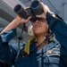 Sailor Aboard USS Carl Vinson (CVN 70) Stands Watch on the Fantail