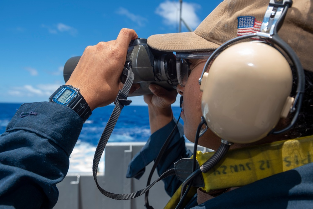 Sailor Aboard USS Carl Vinson (CVN 70) Stands Watch on the Fantail
