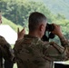 Brig. Gen. Scott C. Woodward observes M2 Bradley zeroing qualification table during Operation Pacific Fortitude