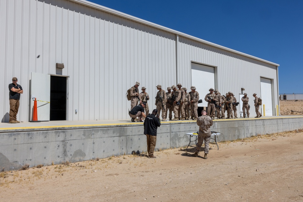 Marines are issued Marine Corps Tactical Instrumentation System gear during SLTE 5-24