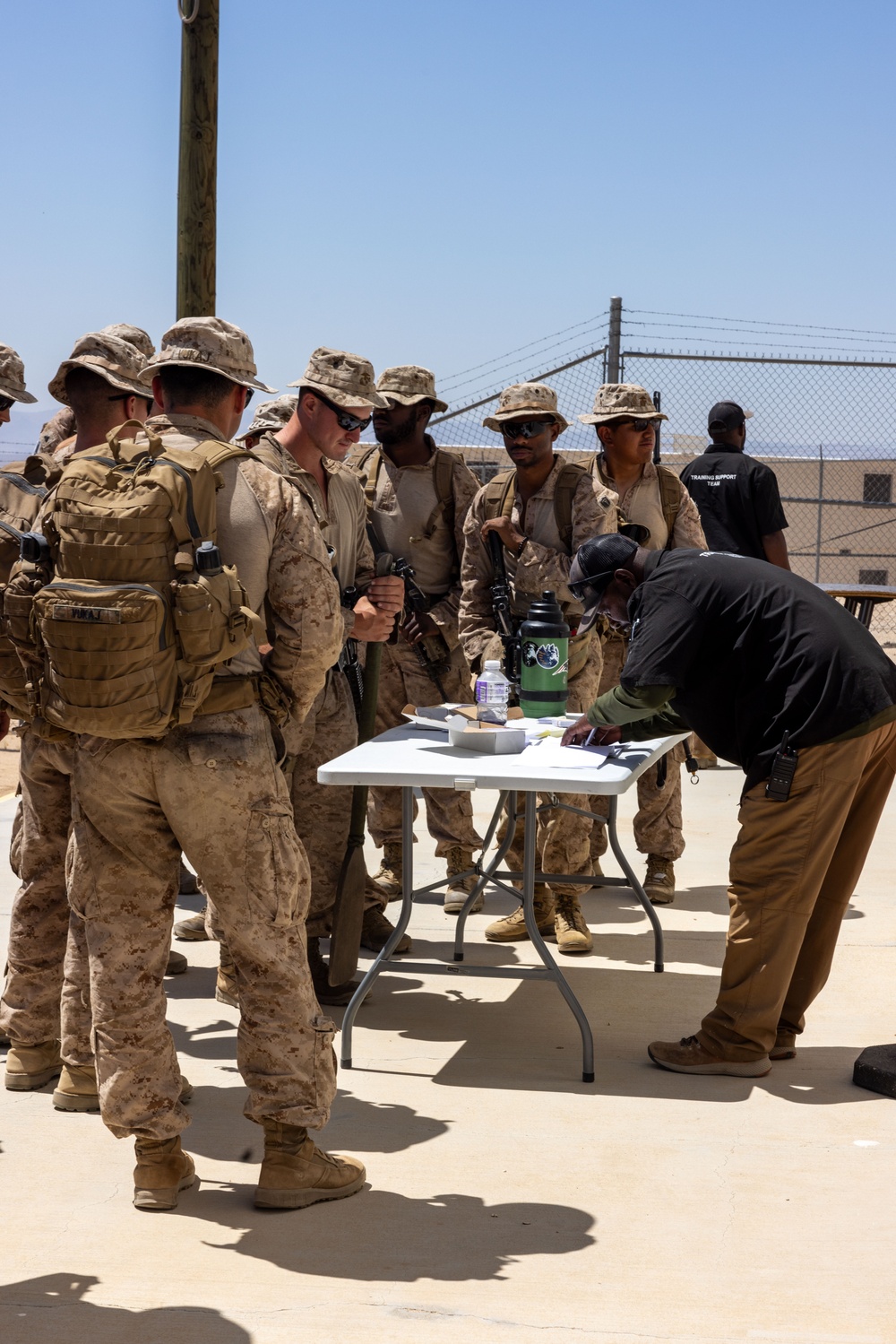 Marines are issued Marine Corps Tactical Instrumentation System gear during SLTE 5-24