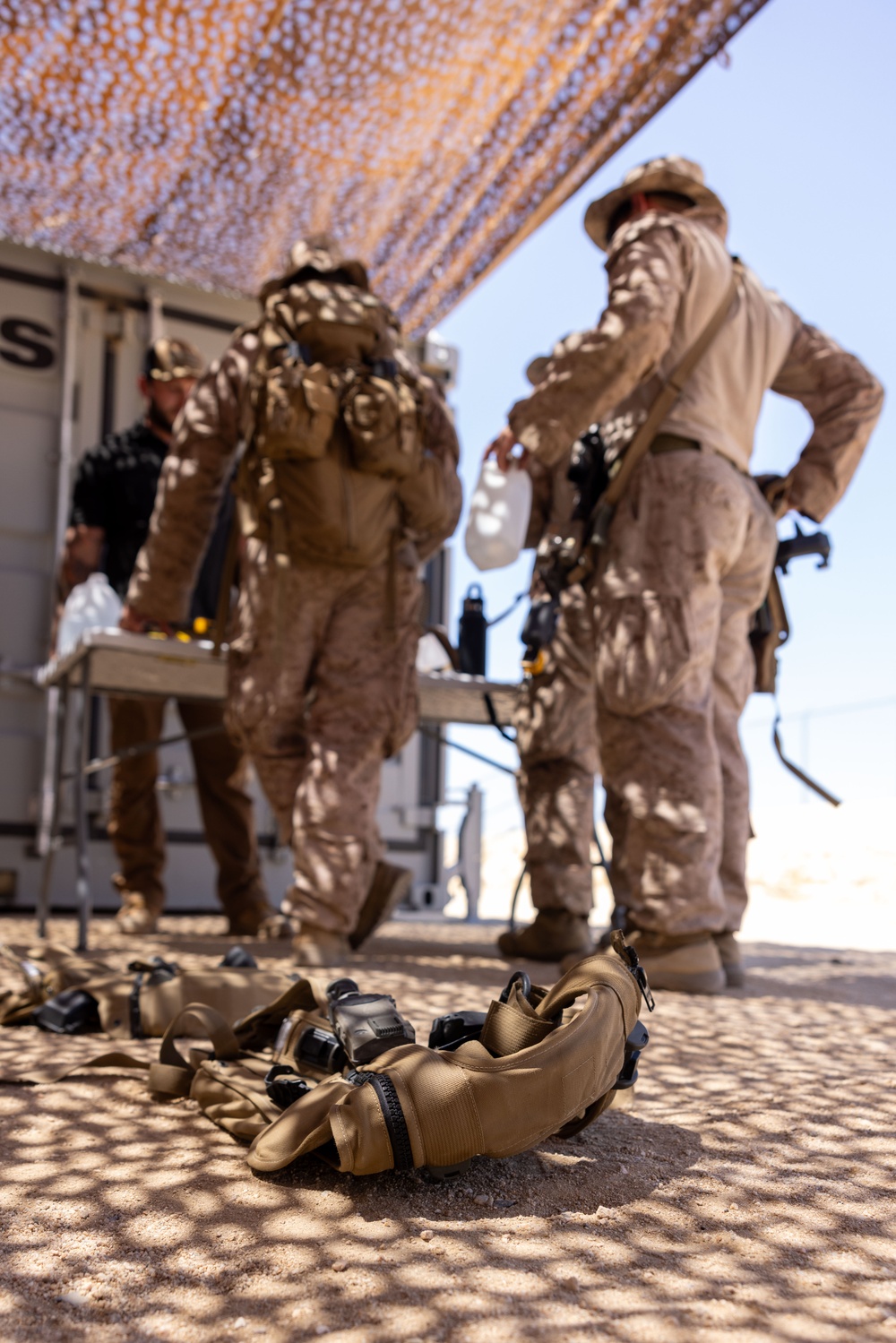 Marines are issued Marine Corps Tactical Instrumentation System gear during SLTE 5-24