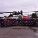 Coast Guard crews pose with Cherry Festival court