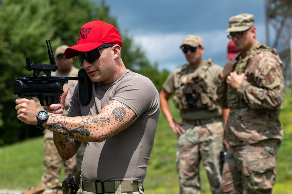 109th Security Forces airmen hone weapons skills for deployment.