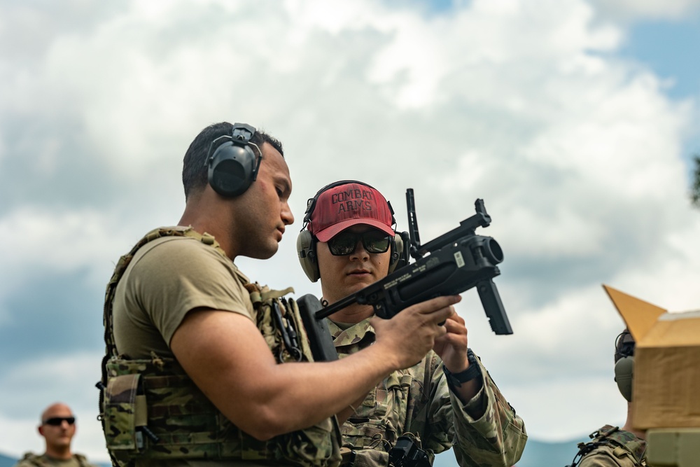 109th Security Forces airmen hone weapons skills for deployment.