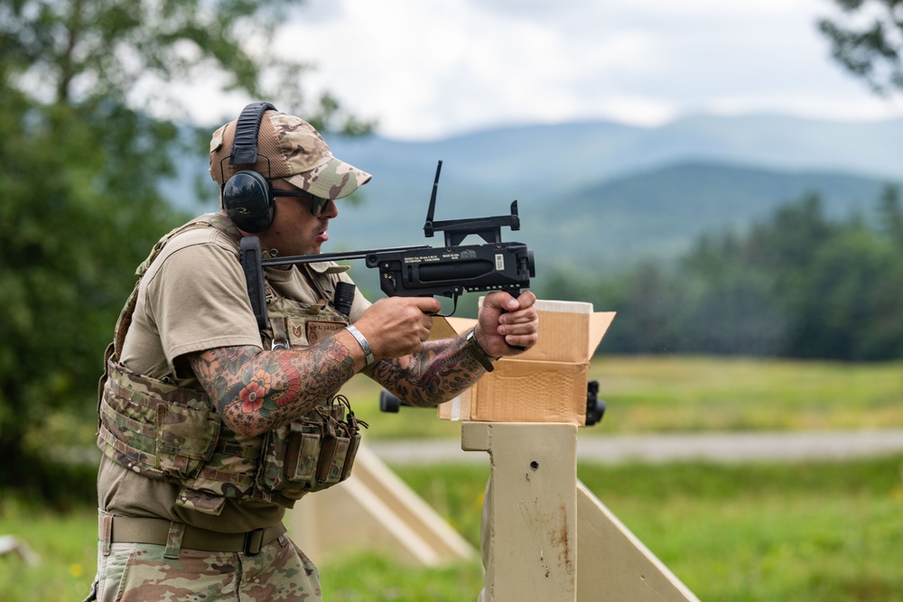 109th Security Forces airmen hone weapons skills for deployment.