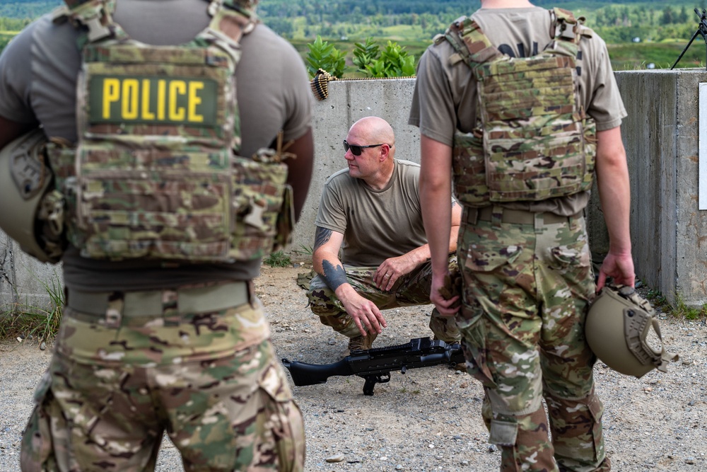 109th Security Forces airmen hone weapons skills for deployment.