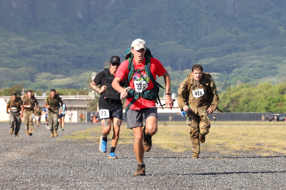 Fast and Fearless: Service members and their families participate in the 2024 Bellows 12k Rucksack Race