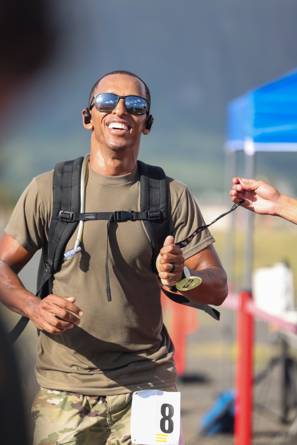 Fast and Fearless: Service members and their families participate in the 2024 Bellows 12k Rucksack Race