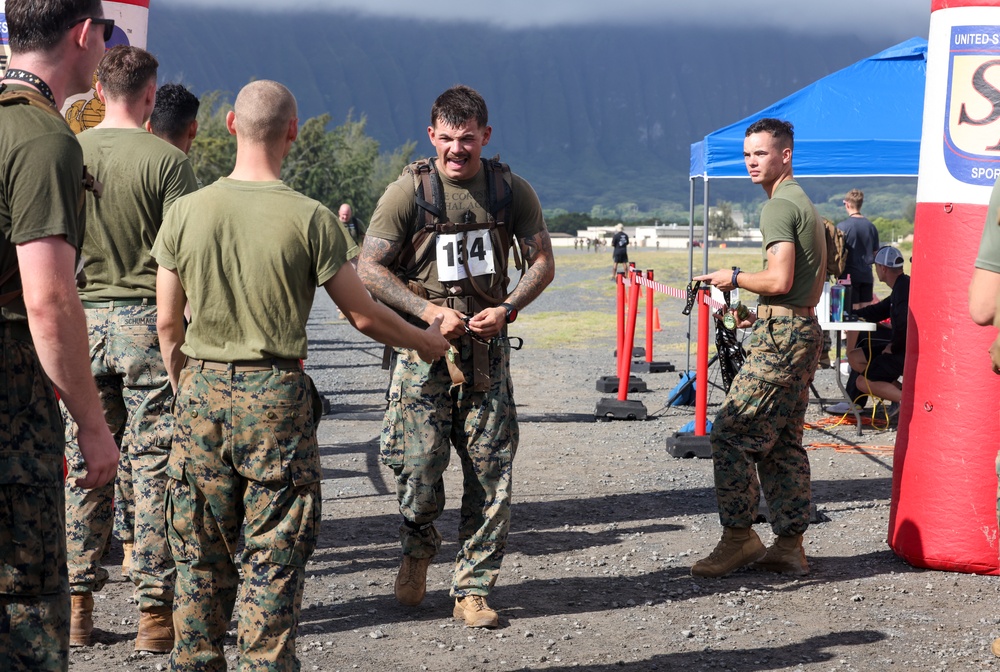 Fast and Fearless: Service members and their families participate in the 2024 Bellows 12k Rucksack Race