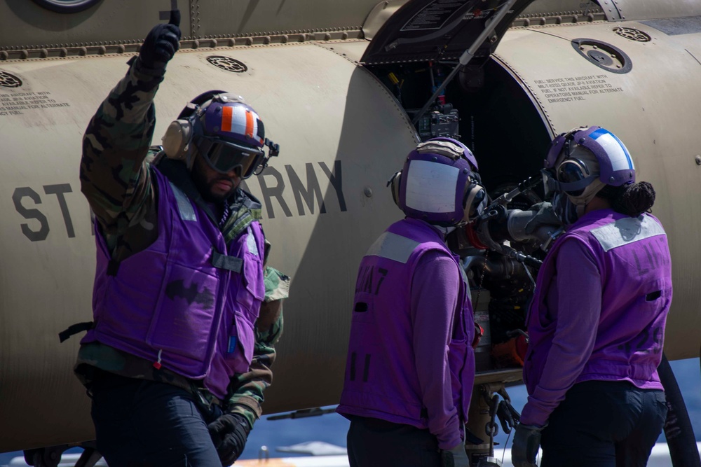 CH-47 Lands on USS Tripoli Flight Deck