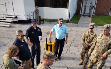 868th Engineer Co. Platoon Sergeant Briefs Suwannee County Fire Rescue Chief