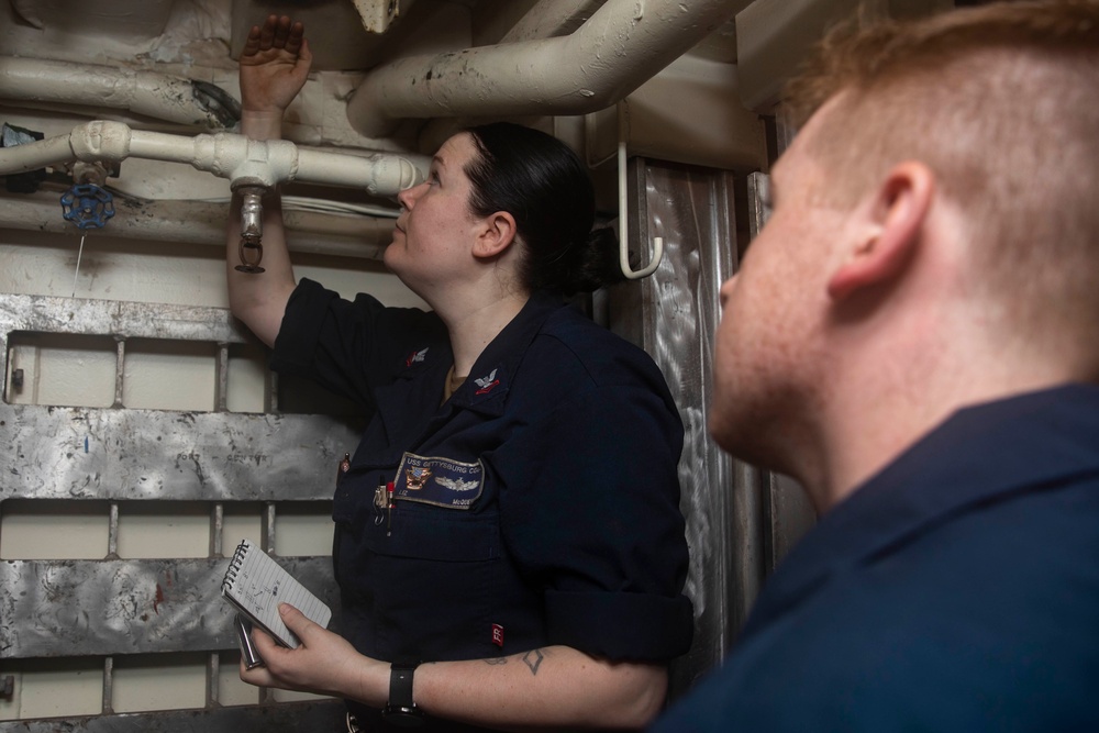Sailors Conduct Maintenance