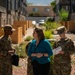 Airmen from the 377th Air Base Wing tour various apartment communities.