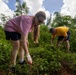 Sailors participate in a community outreach program with Island Girl Power