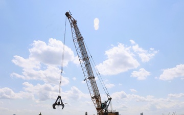 USACE Chicago, Lake Michigan Floating Plant works on Milwaukee Harbor south breakwater