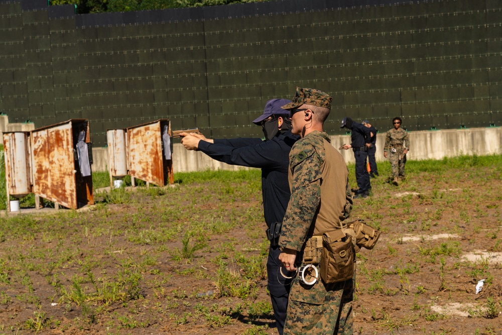 Camp Mujuk Marines and South Korean security guards conduct annual pistol qualification