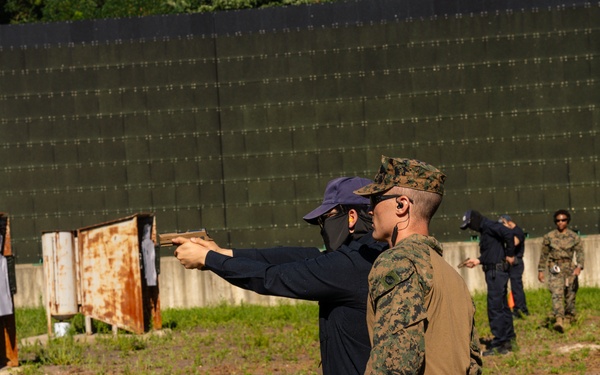 Camp Mujuk Marines and South Korean security guards conduct annual pistol qualification