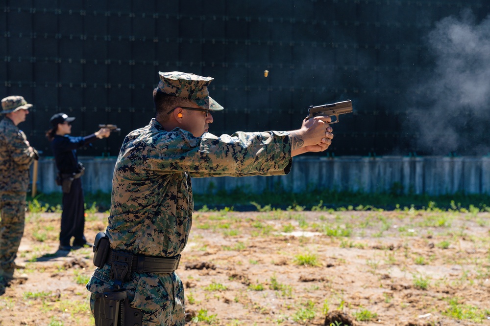 Camp Mujuk Marines and South Korean security guards conduct annual pistol qualification