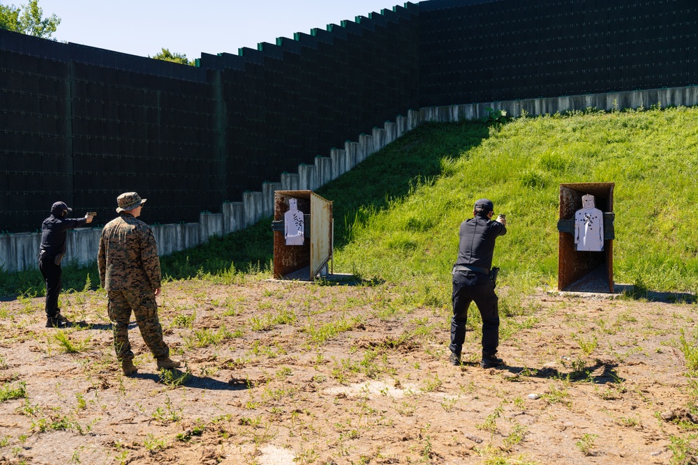 Camp Mujuk Marines and South Korean security guards conduct annual pistol qualification