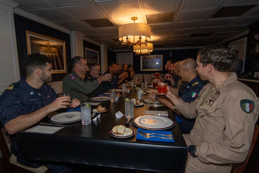 Rear Adm. Cruz and Rear Adm. Ciappina attend have lunch with staff aboard Abraham Lincoln